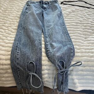 Stylish Fashion Nova Blue Women's Jeans with Unique Tie Detailing size 7